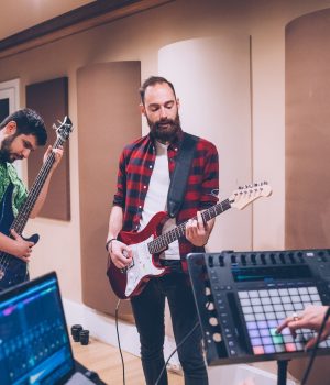 bassist-ang-guitarist-playing-together-having-fun.jpg